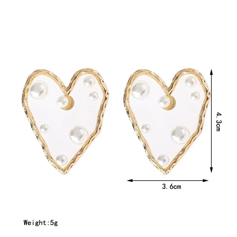 Pendientes de Corazón Geométrico Hueco en Oro para Mujer - Joyería de Amor, Regalos Elegantes